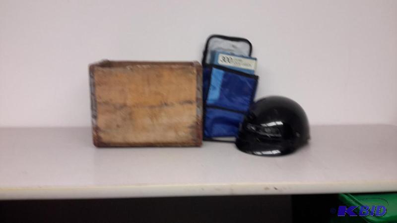 lot 48 image: helmet, cooler, lights, crate, motor