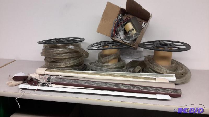 lot 53 image: LED light bars, reels of LED strip, HID light ballast new in box