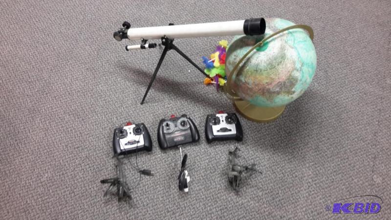 lot 79 image: Remote control helicopters, telescope, globe