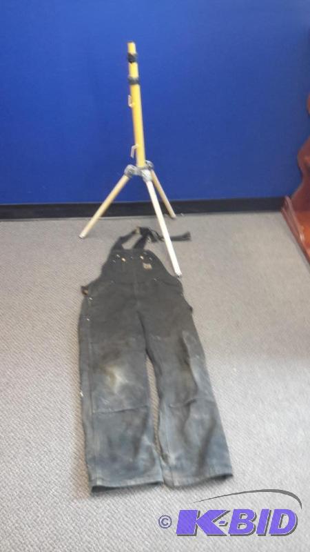 lot 84 image: Carhart coveralls 32 x 34 and tripod