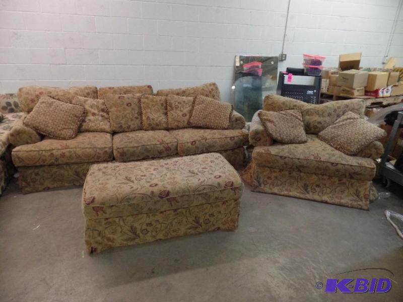 lot 18 image: Artisan Sofa, Upholstered Chair, and Ottoman Set