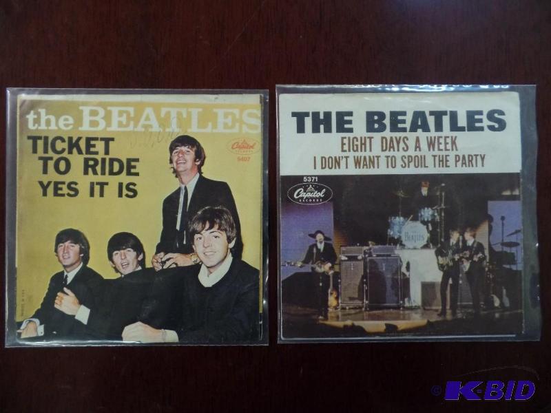 lot 49 image: Two Vintage 45 rpm Records of The Beatles