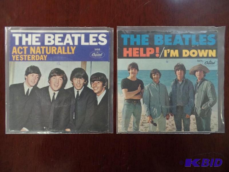 lot 51 image: Two Vintage 45 rpm Records of The Beatles