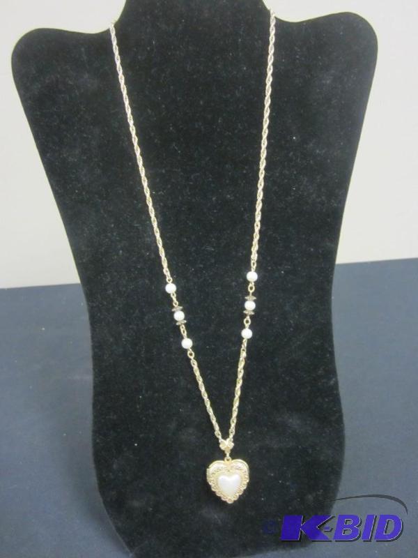 Vintage gold tone 12 inch heart shape locket necklace with pearl accents.