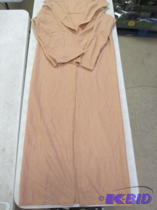 Brown snuggle blanket with sleeves