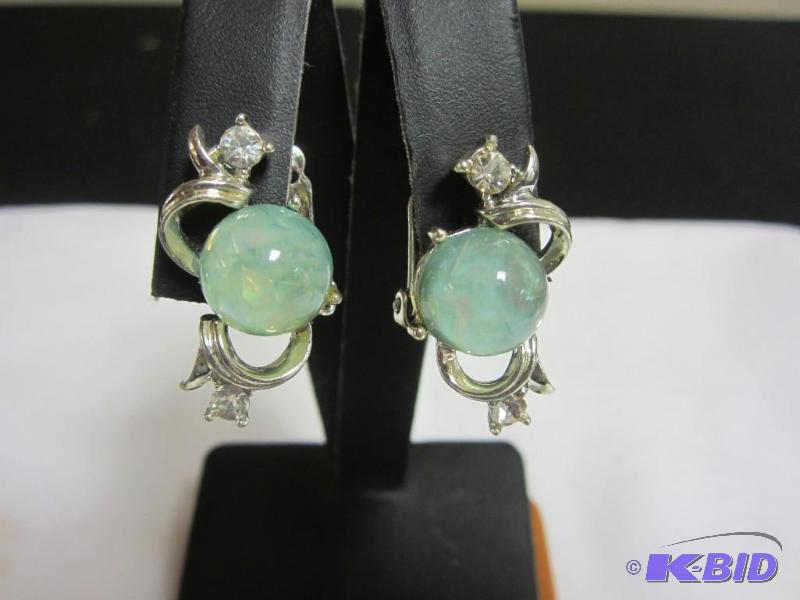 Vintage Cara silver tone earrings with rhinestones and green stones
