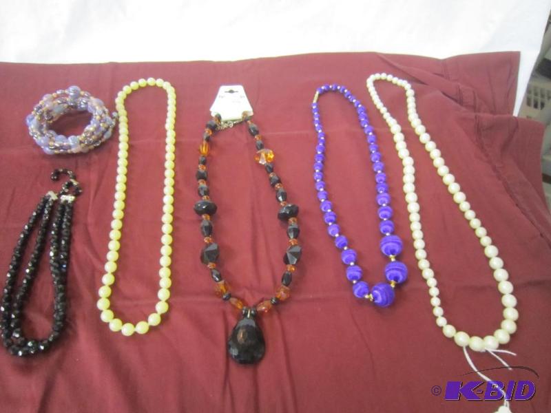 6 Pieces of Jewelry - 5 Necklaces and 1 Bracelet (1 necklace is a 1950s popper)