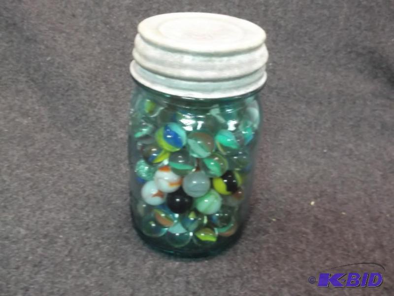 lot 43 image: Vintage Ball canning jar full of marbles....