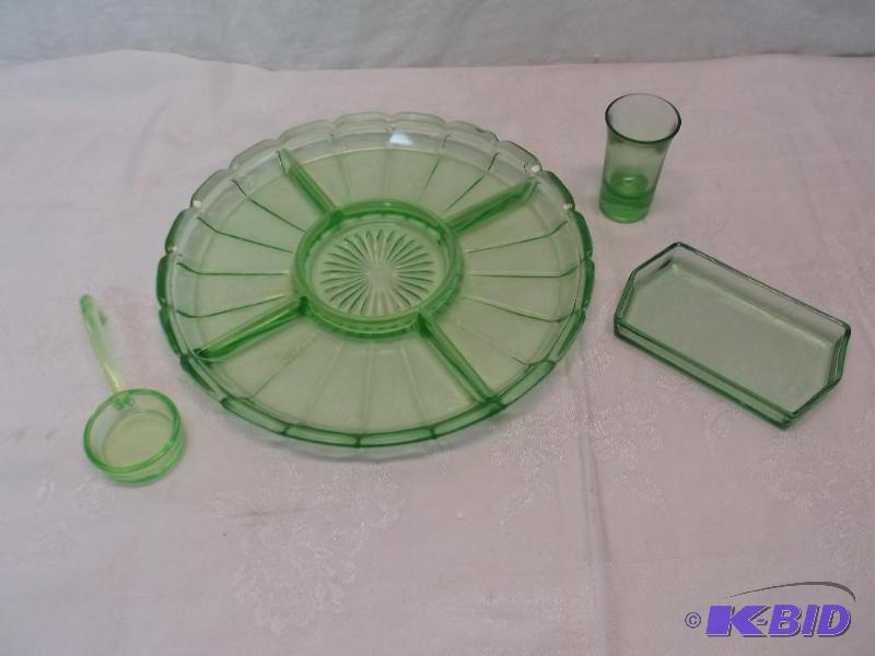 lot 57 image: Lot of green glass possible Vaseline glass....