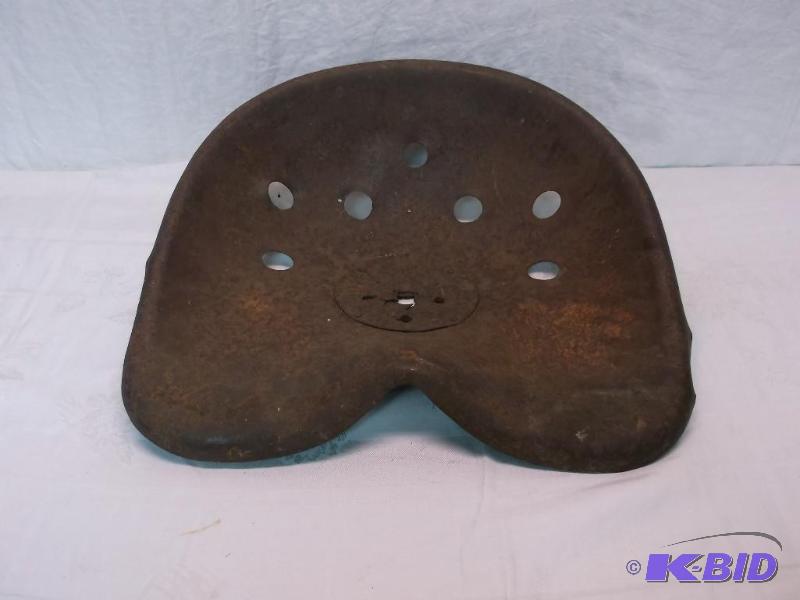 lot 71 image: Vintage tractor seat....