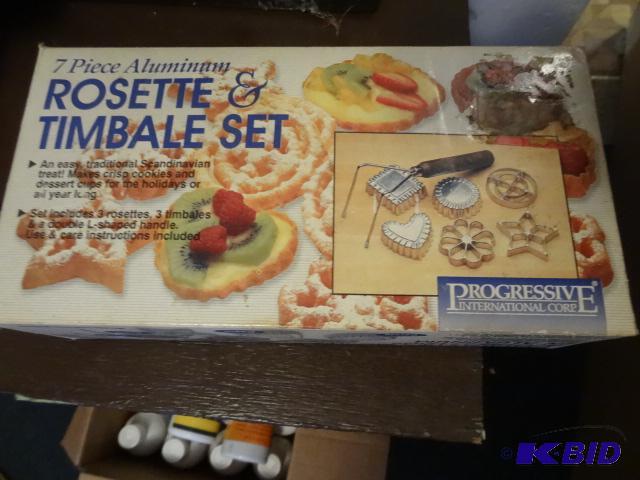 lot 125 image: Rosette iron set, NIB...