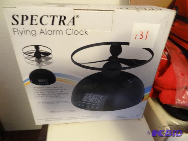 lot 131 image: Spectra flying alarm clock, must get out of b...