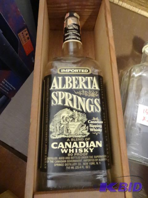 lot 146 image: Alberta Springs Canadian whiskey bottle in wo...