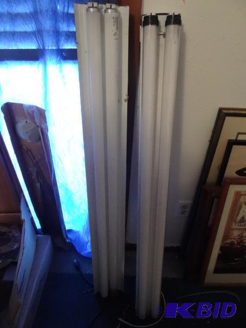 lot 179 image: (2) 4 fluorescent light fixtures...