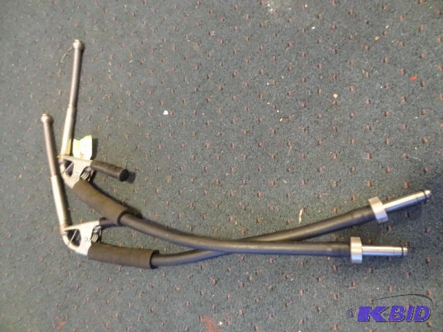 lot 200 image: 2 dispensing hoses with clamps, unknown make ...