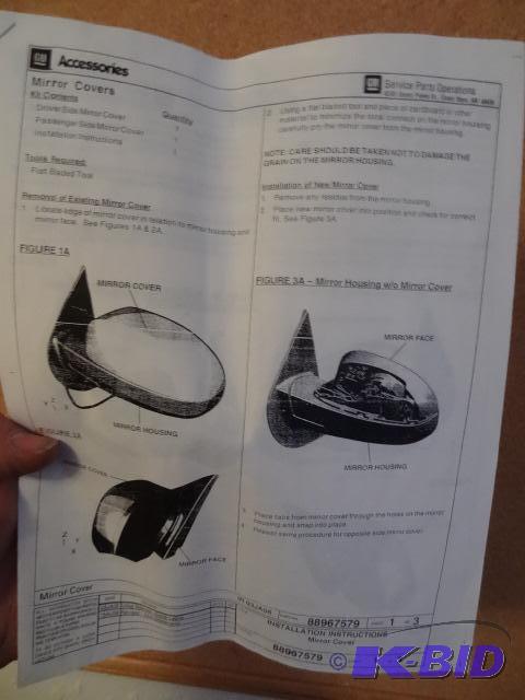 lot 214 image: Delco GM mirror cover pair part number 178005...