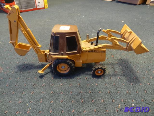 lot 217 image: Die cast Case 580E tractor with front end loa...