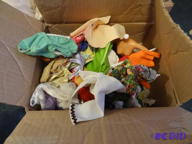 lot 225 image: Box of misc Barbie doll clothes and partial d...