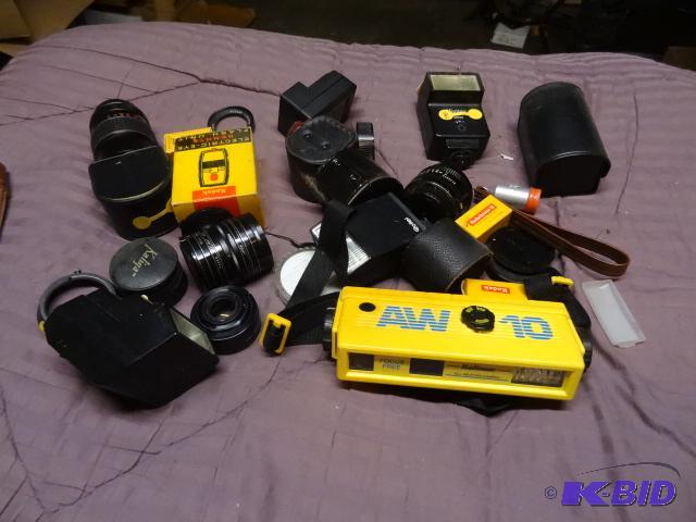 lot 69 image: Lot of misc camera lenses, flashes, etc...