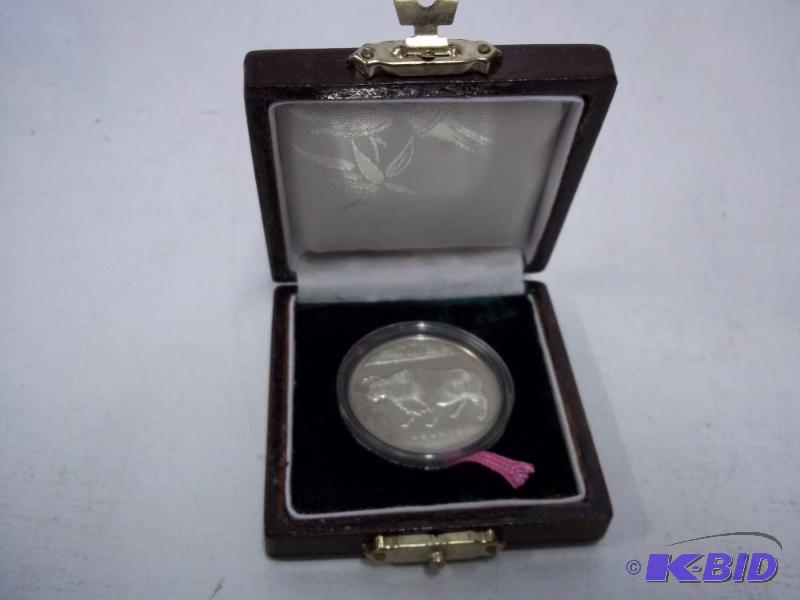 lot 7 image: Asian Coin with case...