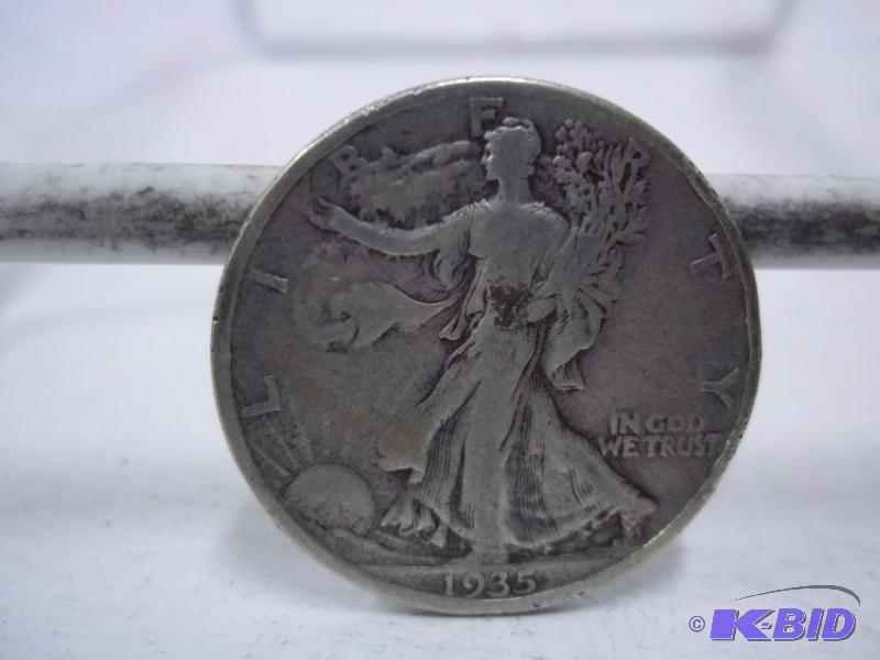 lot 70 image: 1935 Walking Liberty Half Dollar...