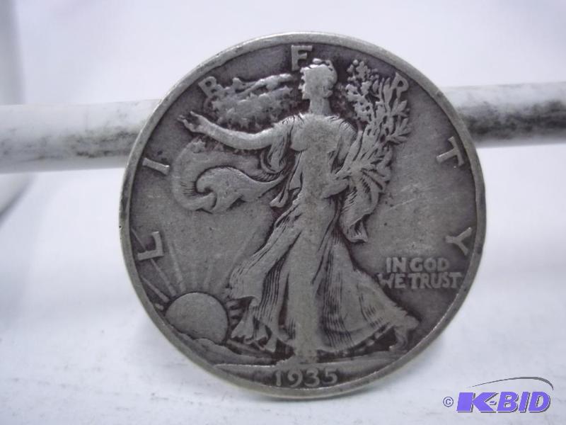 lot 79 image: 1935 Walking Liberty Half Dollar...