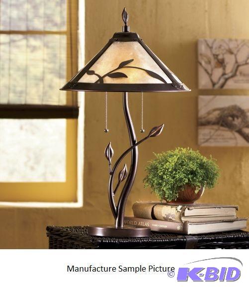 lot 116 image: Mica Table Lamp - Its base is artistically de...
