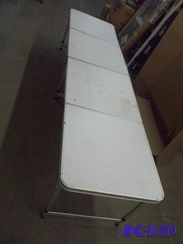 lot 23 image: 8 Ft. Folding Table
