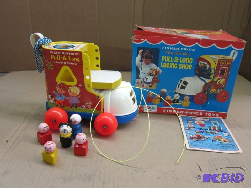 lot 34 image: Fisher-Price Toys Pull-A-Long Lacing Shoe Set