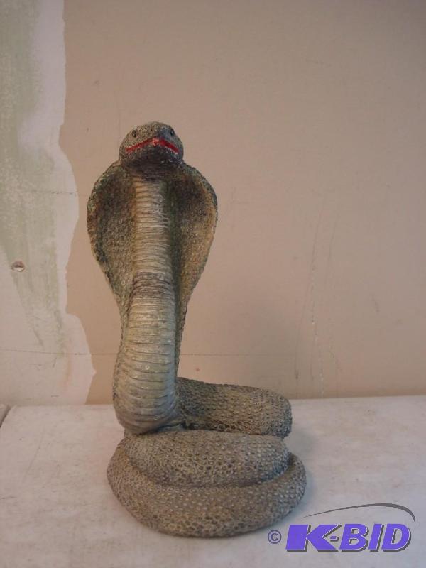 lot 15 image: Plaster Cobra Snake...