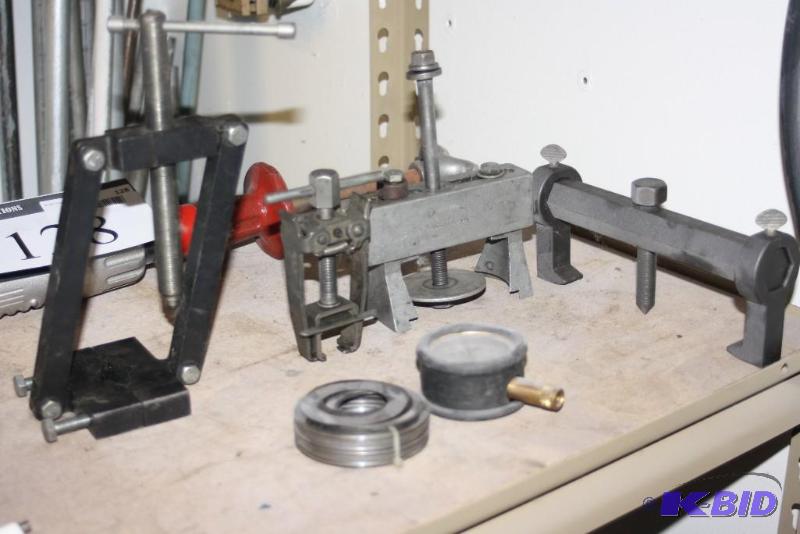 lot 129 image: Table Lot Including Pressure Gauge Circle Vise, Metal Nail Vise wBolt Down Nail Head And More.