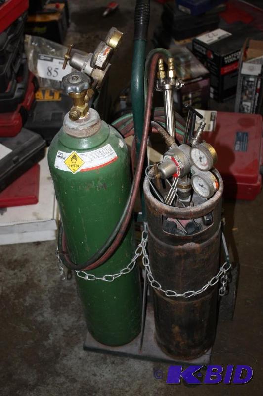lot 33 image: Welding Stand wOxygen Tank & Miscellaneos Tank Includes Hand Roller Gauges And Tubes.