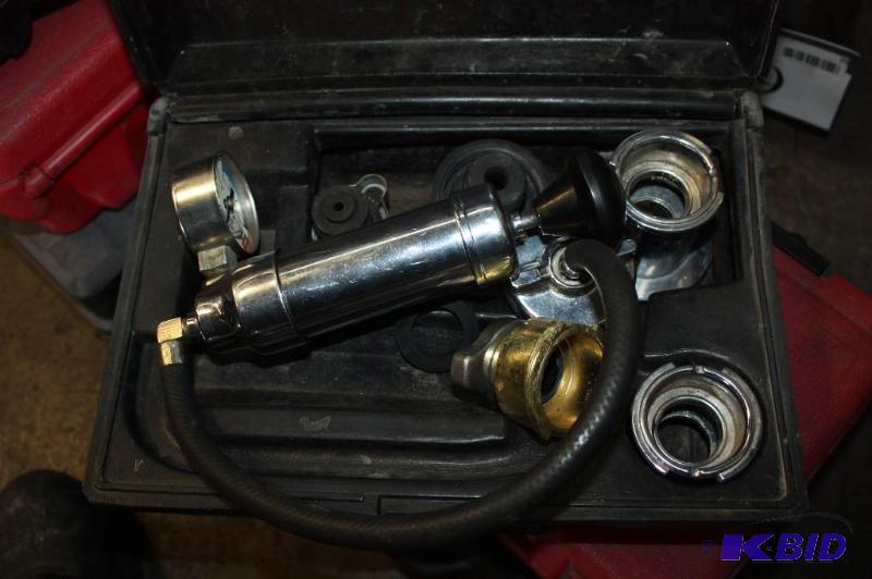 lot 75 image: Case Lot Including Cooling System Pressure Tester Gauges Cords And More.