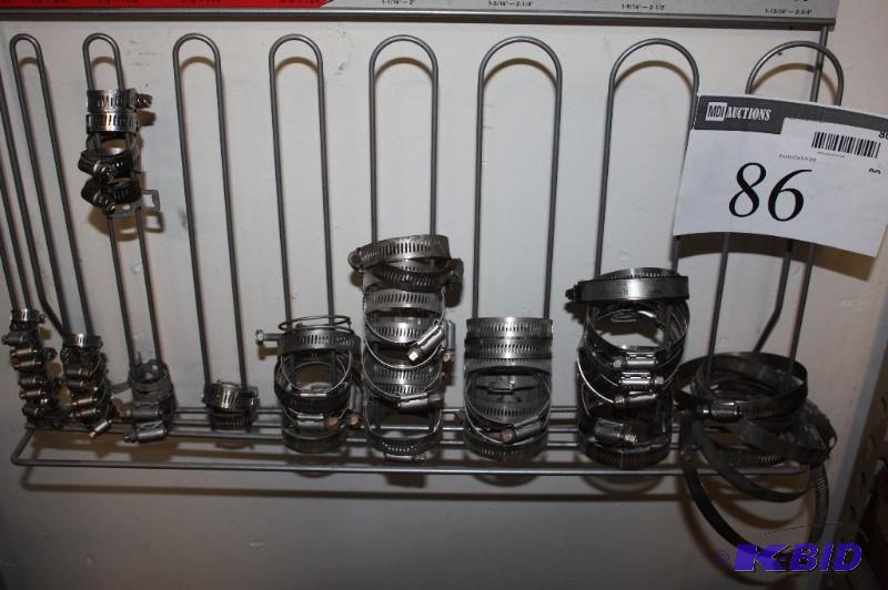 lot 86 image: Mighty Auto Parts Stainless Steel Clamps Miscellaneous Sizes 4-36 Includes Display Rack.