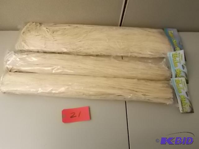 lot 21 image: (2) Hula Skirts & (1) Table Skirting...