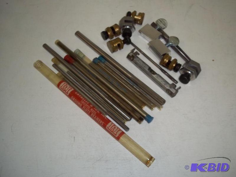 lot 127 image: Drill bits, reamers and small line level...