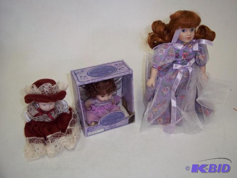 lot 172 image: 3 Porcelain Dolls one with box...