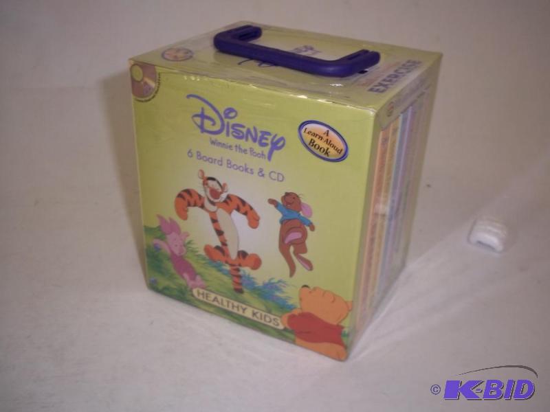 lot 186 image: Winnie the Pooh 6 board books with CD...