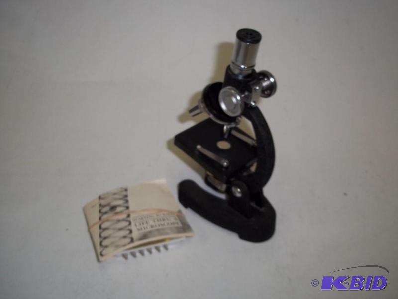 lot 248 image: Microscope with slides...