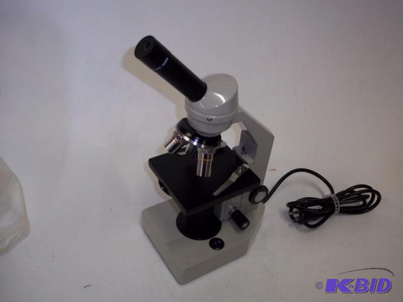 lot 33 image: Microscope with light...