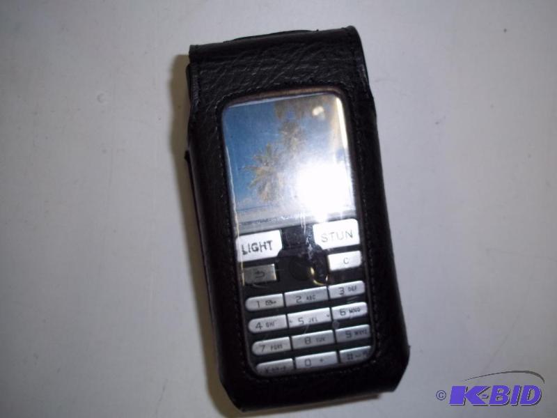 lot 6 image: Stun Gun  Light gun...