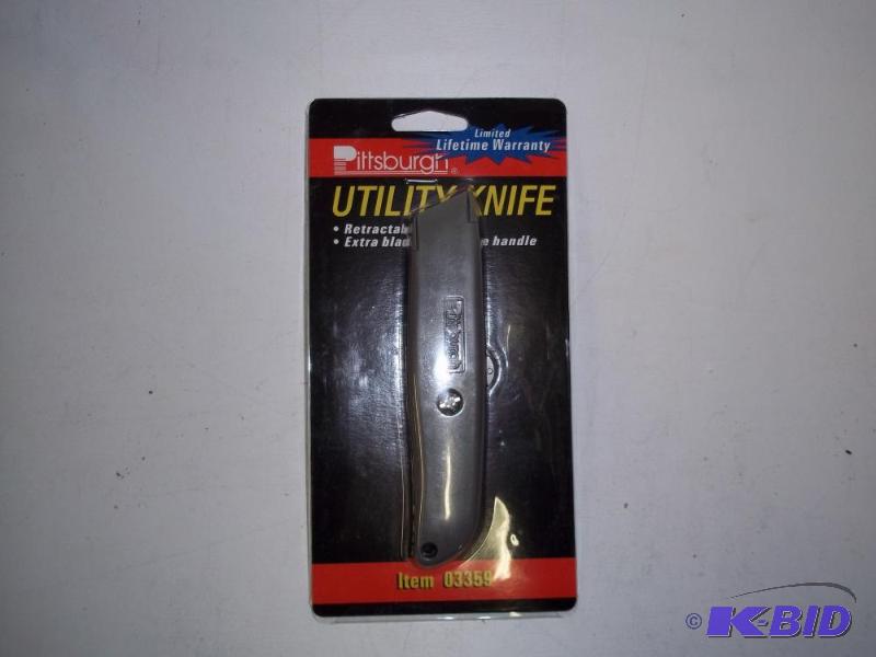 lot 9 image: New in package Utility Knife...