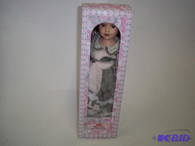 lot 98 image: Doran 15" Porcelain doll...