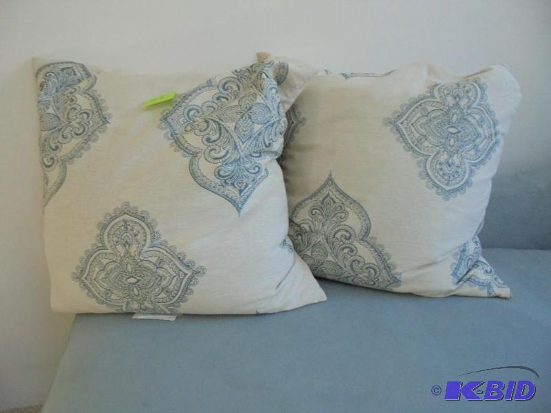 Pair of sky blue and white throw pillows. &nb...