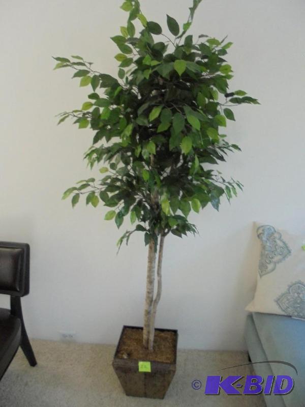 Artificial tree in planter. &nbsp...