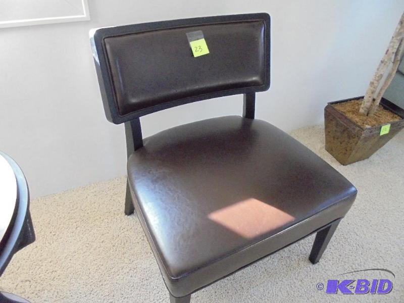 Brown leather with solid wood legs side chair...