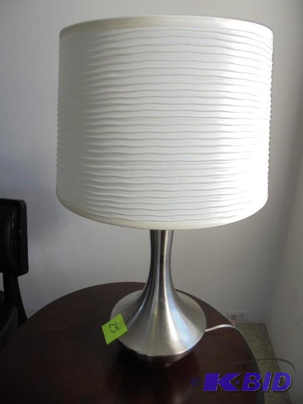 Brushed stainless steel lamp with shade....