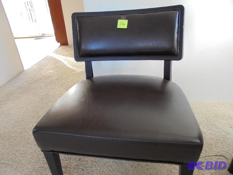 Brown leather with solid wood legs side chair...