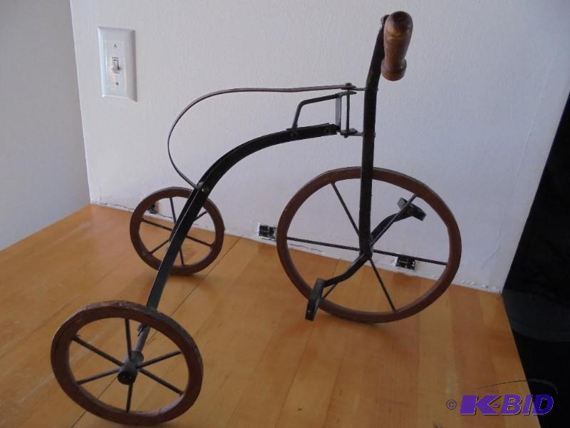 Metal and wood decorative tricycle, missing o...