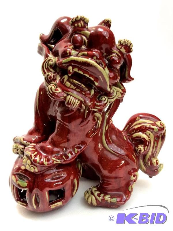 Large Well Made Red Glazed Ceramic Fu Dog on Openwork Ball